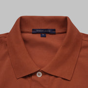 Shop classic fit pique copper polo shirt for men summer 2026 by Dockland - تسوق قميص بولو بيكيه رجالي كلاسيك نحاسي احمر صيفي 2026 من دوكلاند - ملابس رجالي كاجوال صيفي