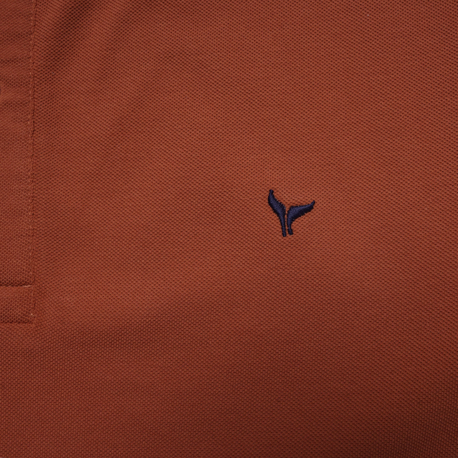 Shop classic fit pique copper polo shirt for men summer 2026 by Dockland - تسوق قميص بولو بيكيه رجالي كلاسيك نحاسي احمر صيفي 2026 من دوكلاند - ملابس رجالي كاجوال صيفي